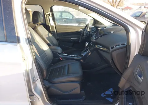 2014 Ford Escape Titanium z USA, uszkodzony, nr VIN 1FMCU0JX9EUB65991